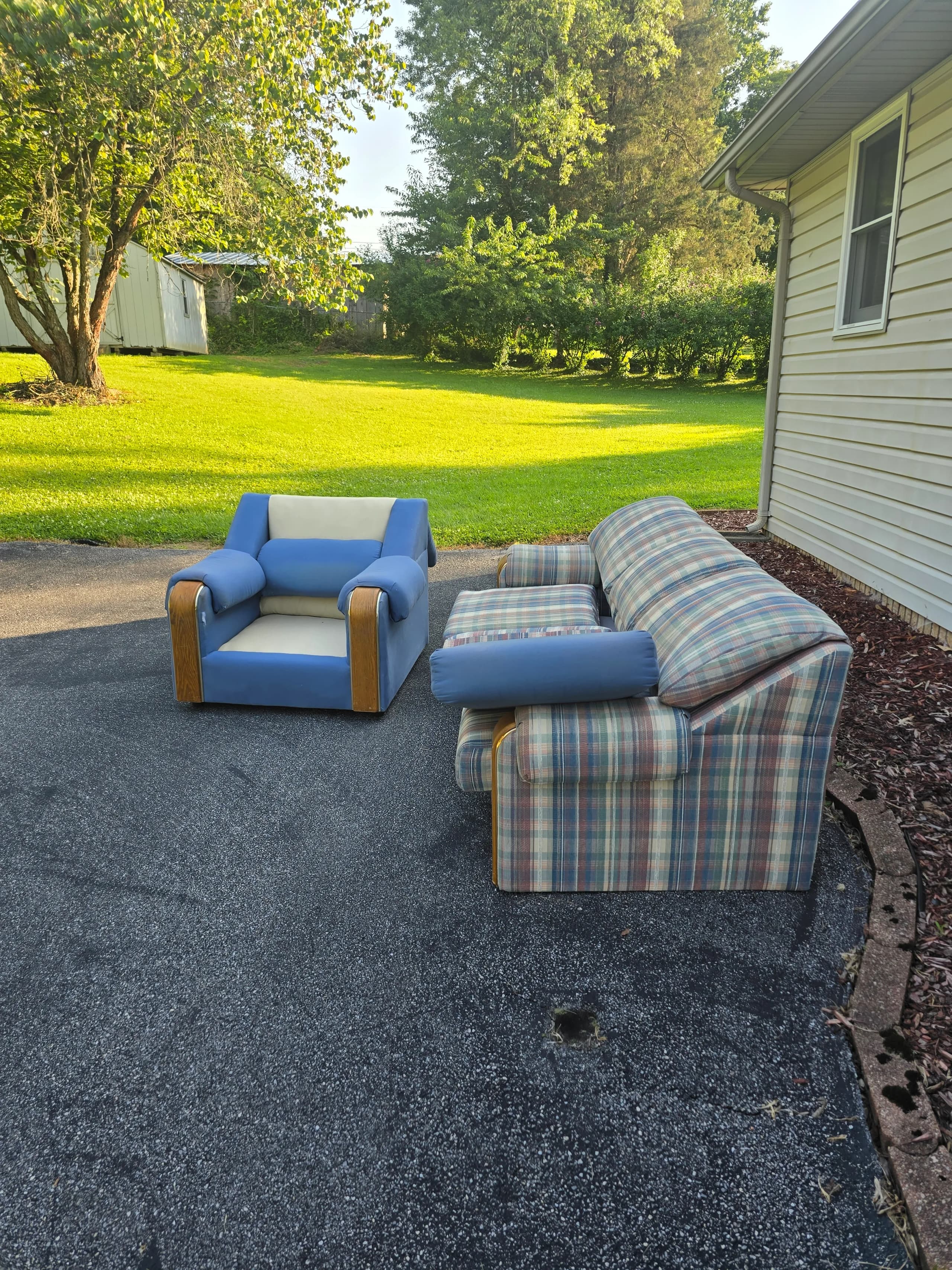 Couch and recliner before furniture removal in Bristol, TN