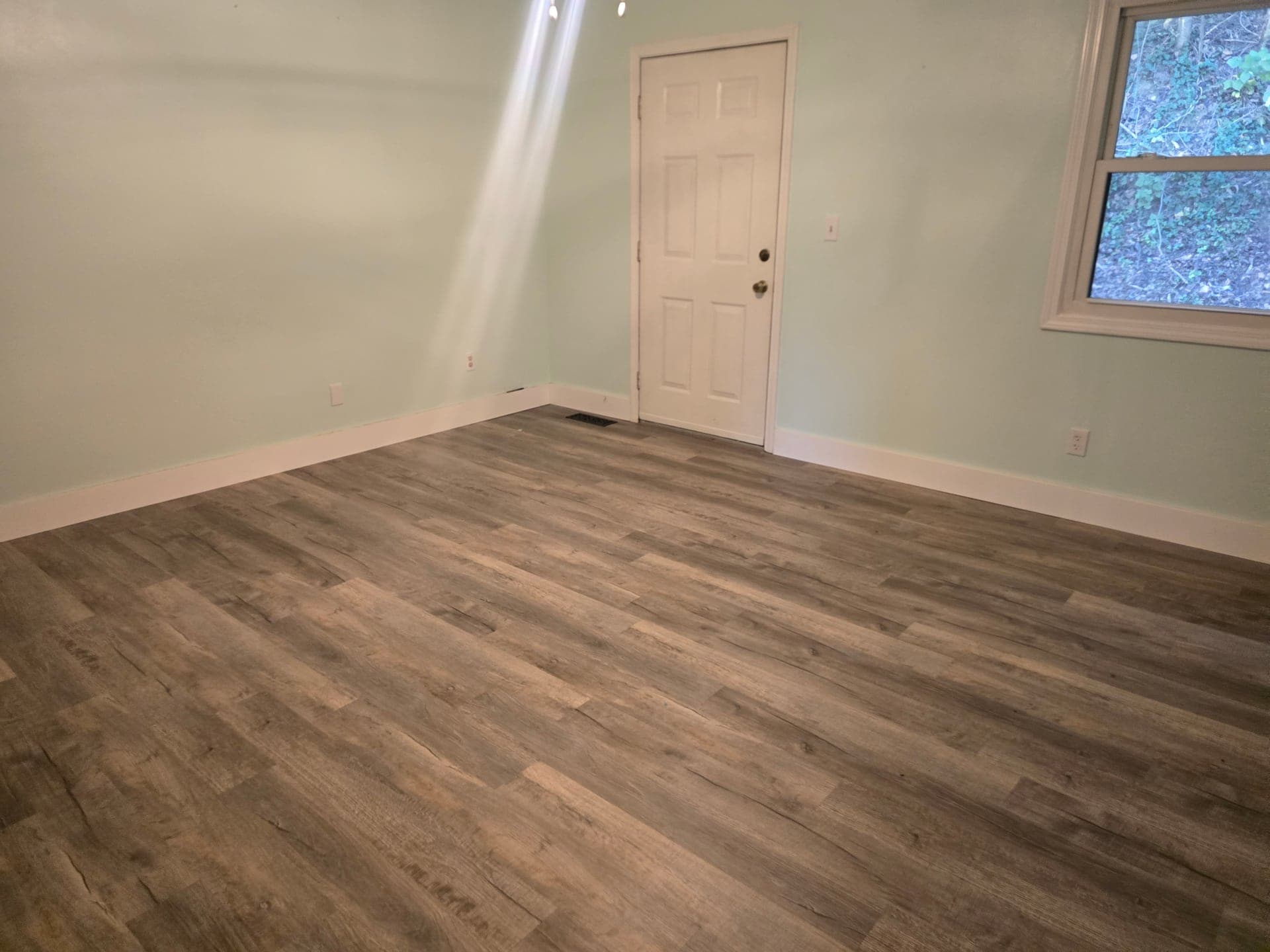 Empty cleared bedroom after an estate cleanout in Bristol, TN