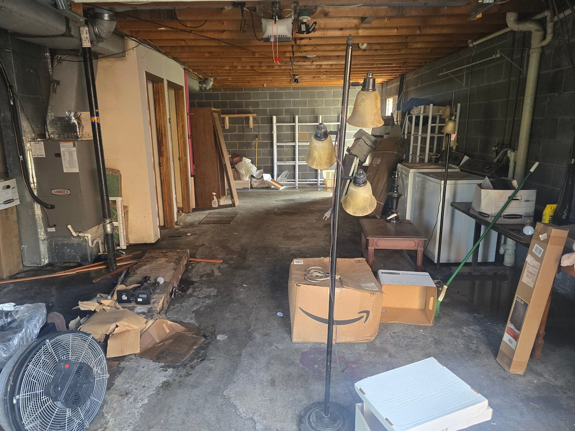 Basement before a cleanout in Kingsport, TN