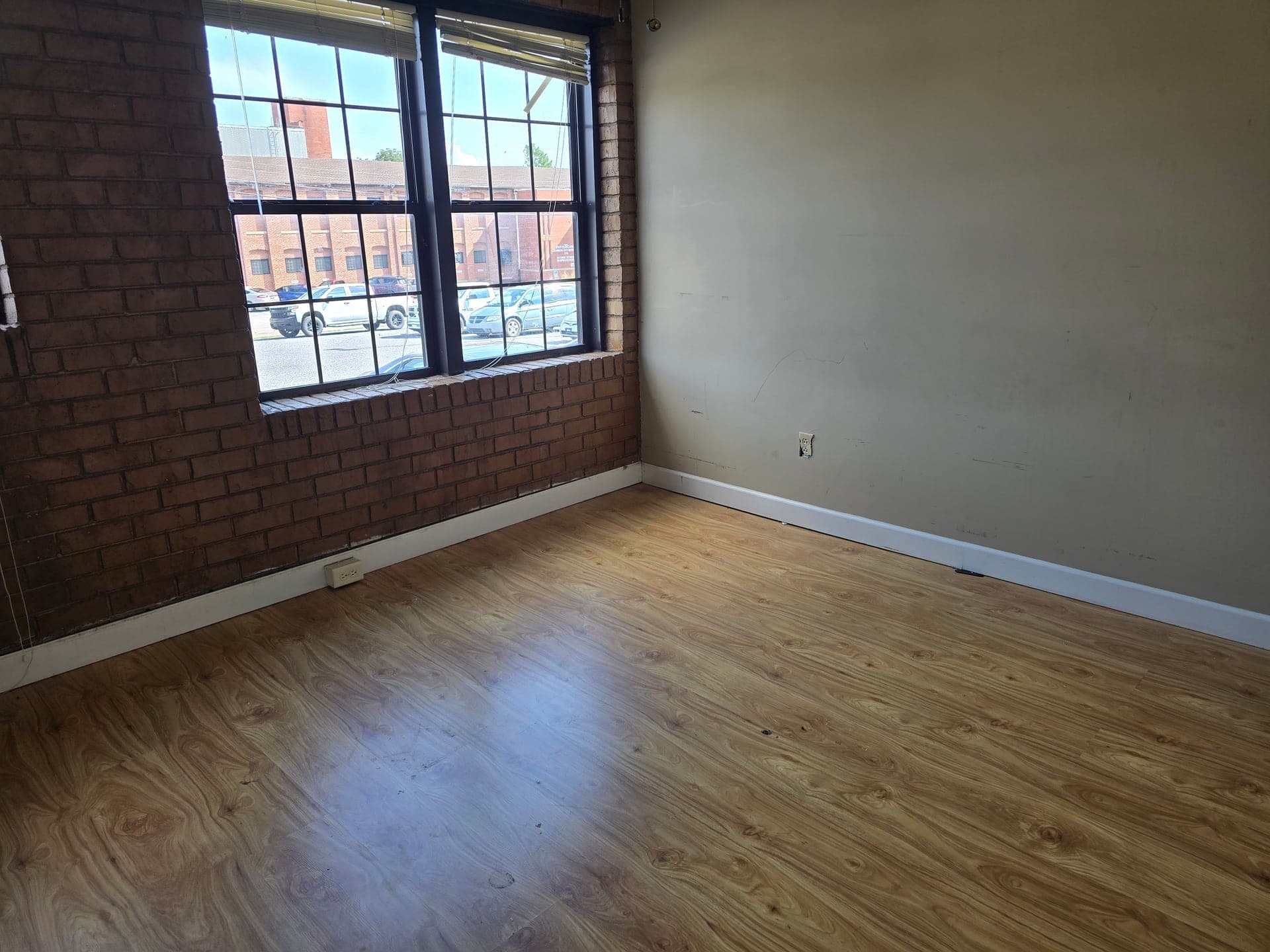 Empty room with wood floors after furniture removal in Johnson City, TN