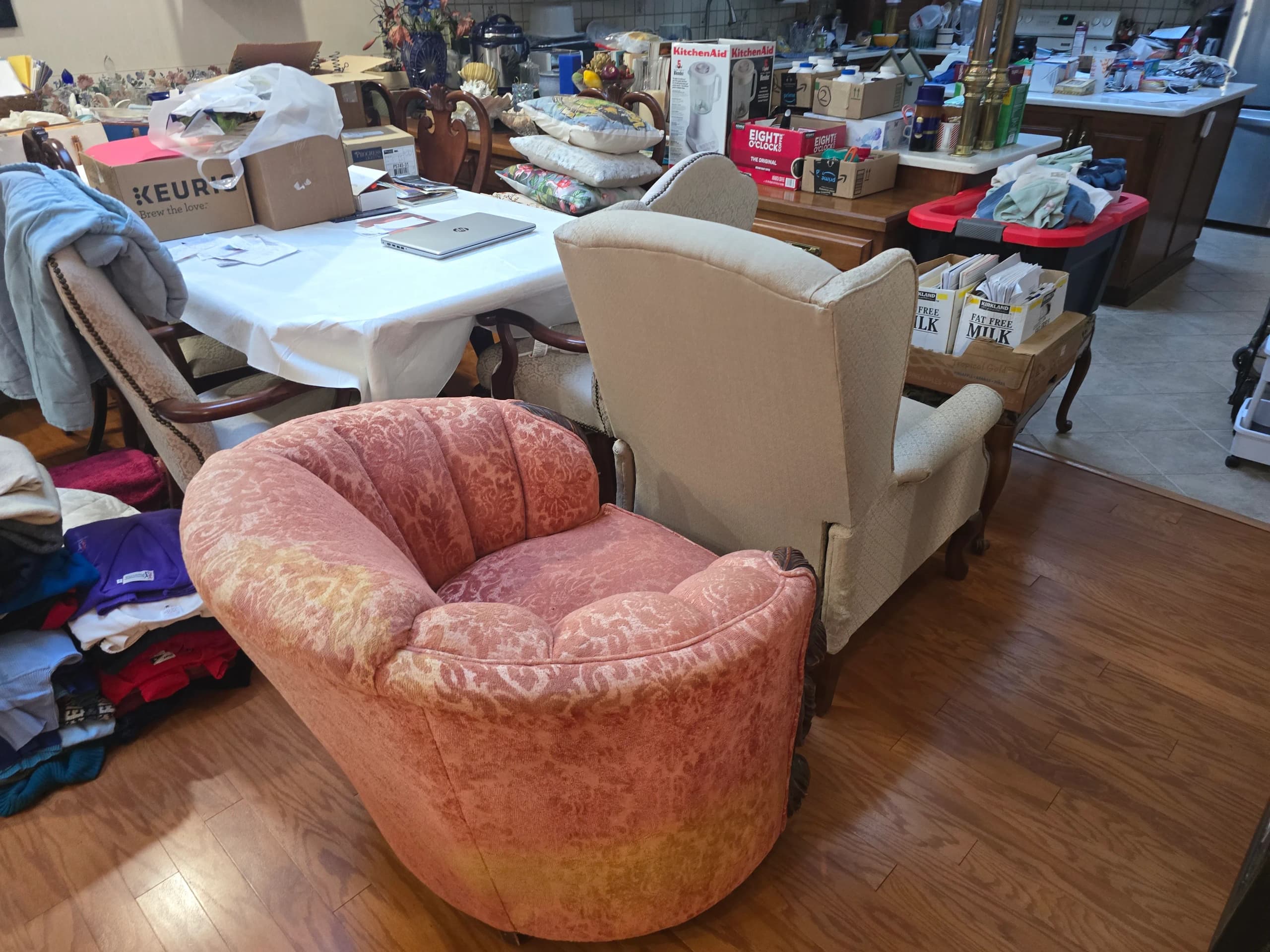 Chairs staged for furniture removal by Kraken Junk Removal