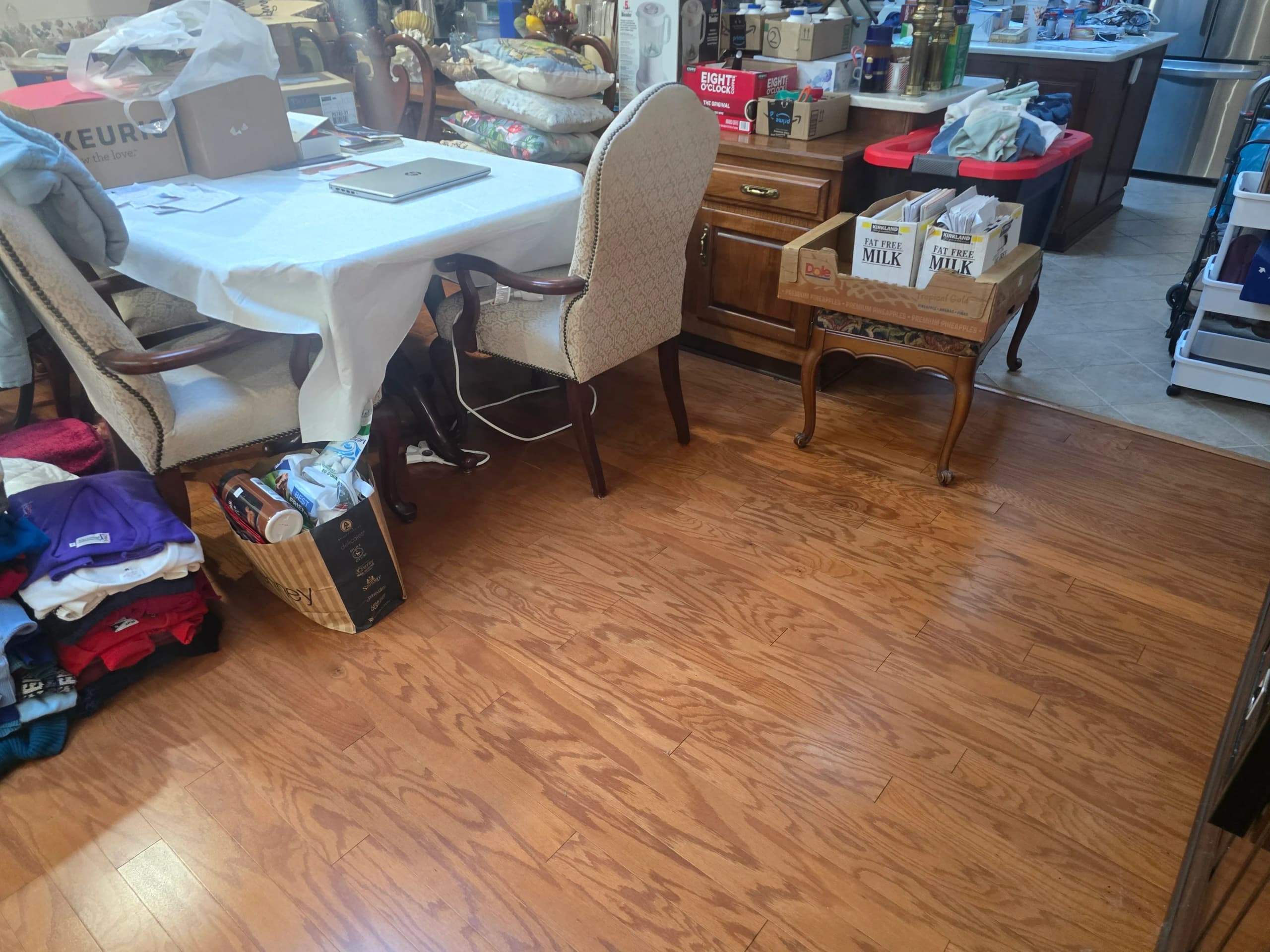 Cleared floor space after furniture removal by Kraken Junk Removal
