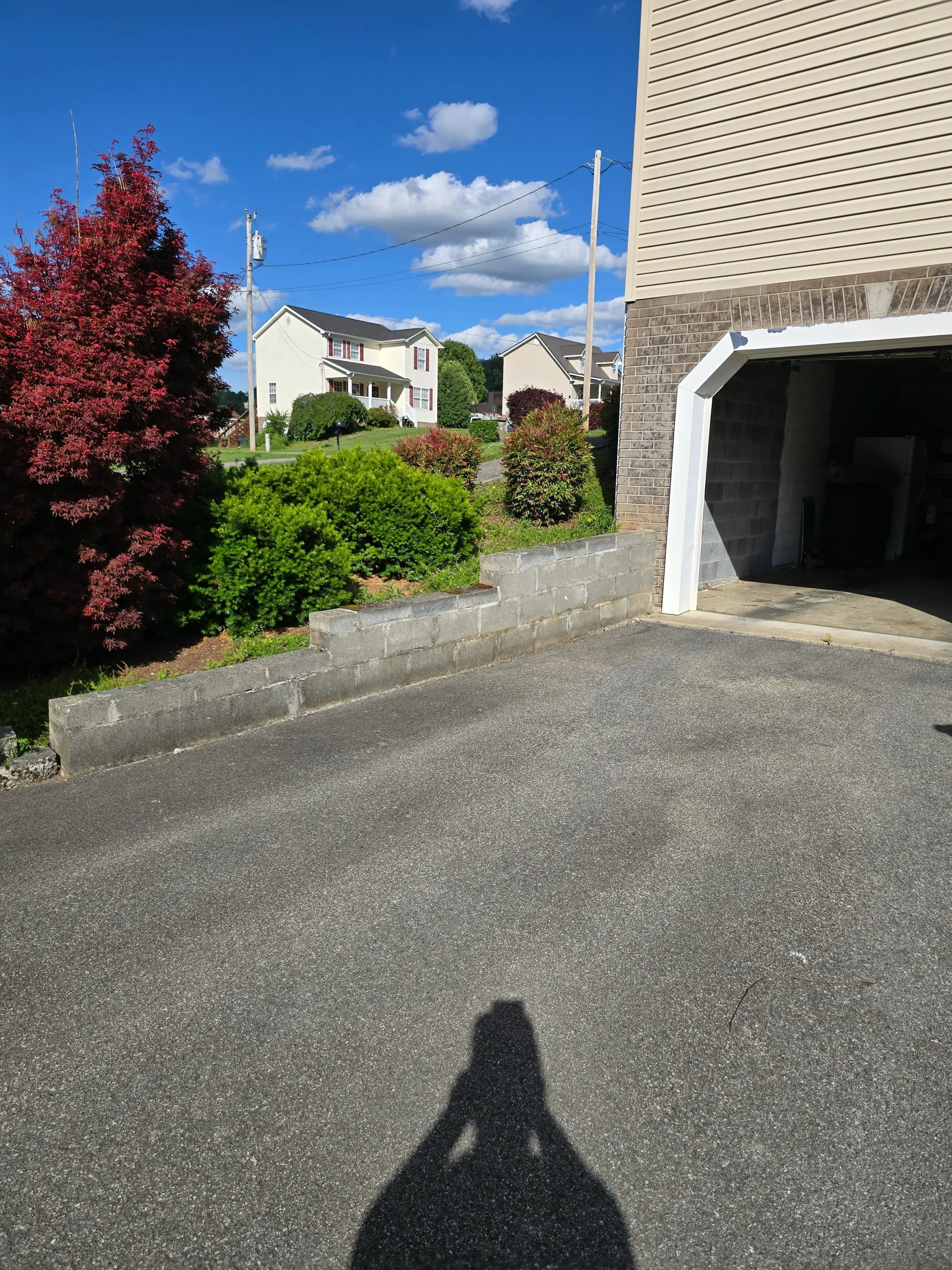 Driveway cleared after furniture removal by Kraken Junk Removal