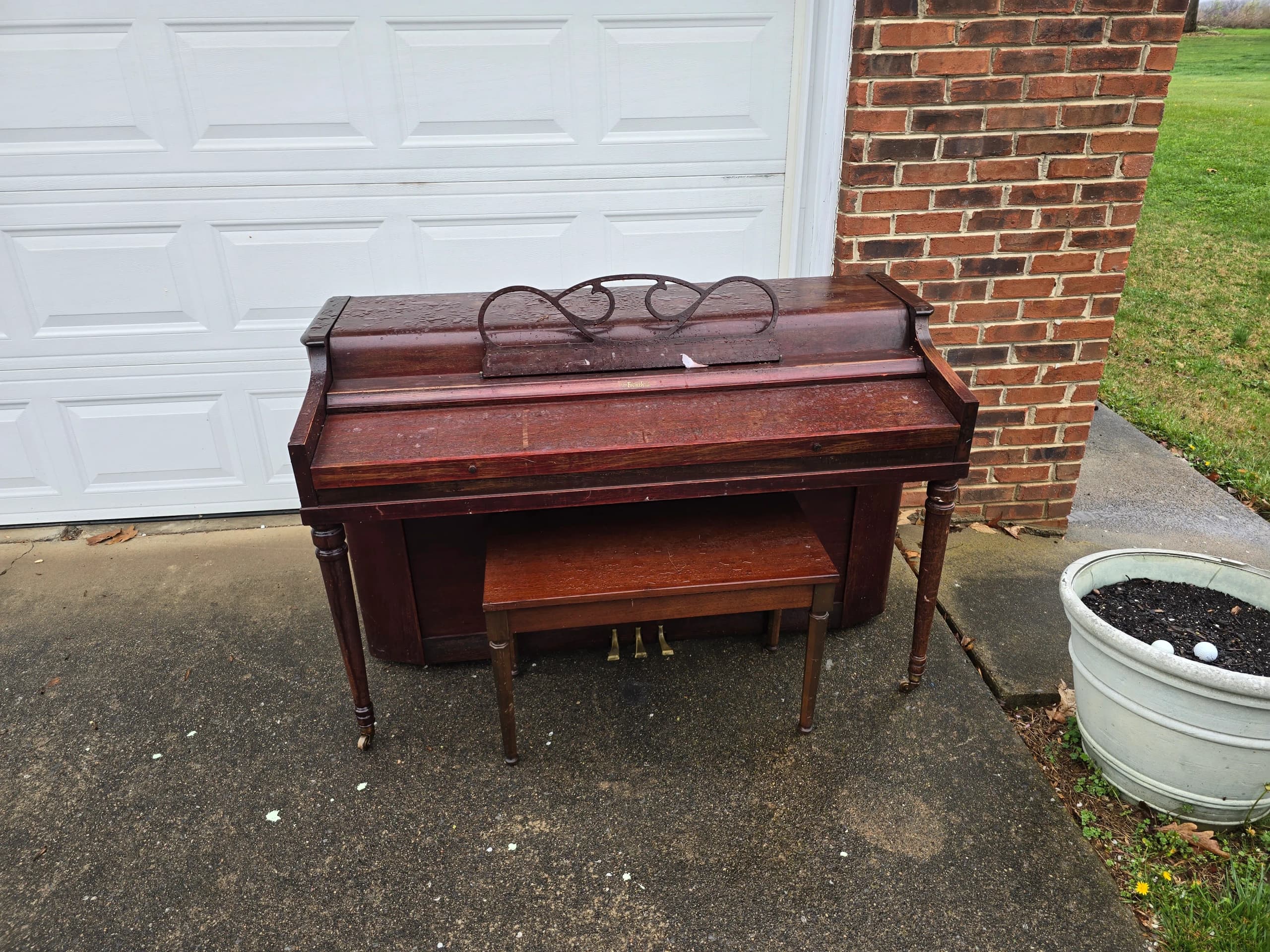 Spinet piano before removal in Kingsport, TN