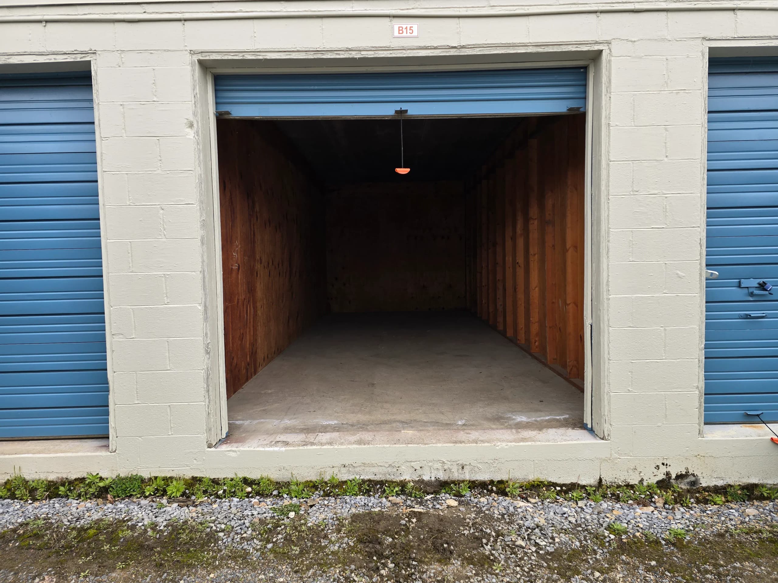 Empty outdoor storage unit B15 after a cleanout