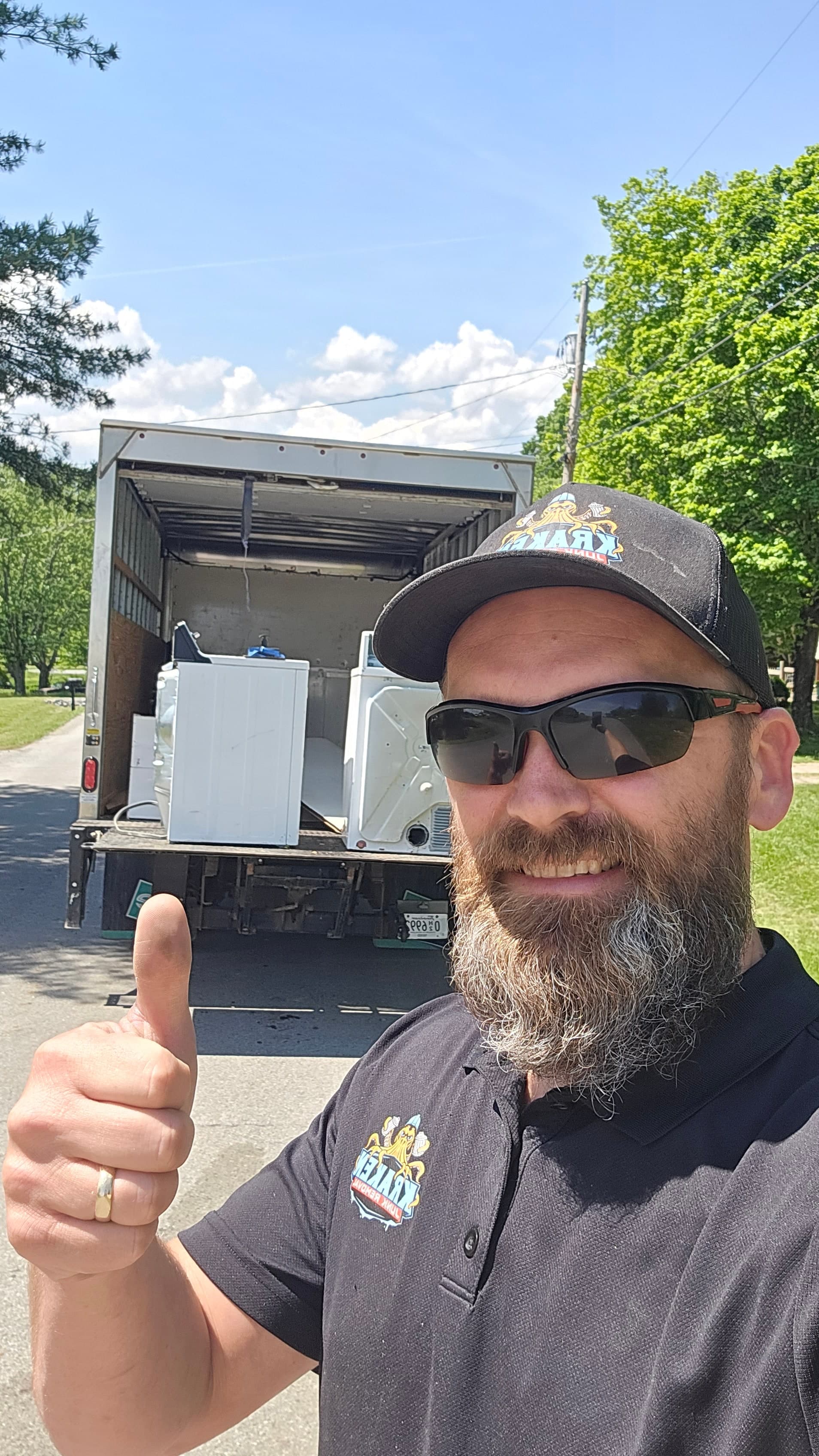 Kraken Junk Removal crew loading household appliances for appliance removal in the Tri-Cities, TN