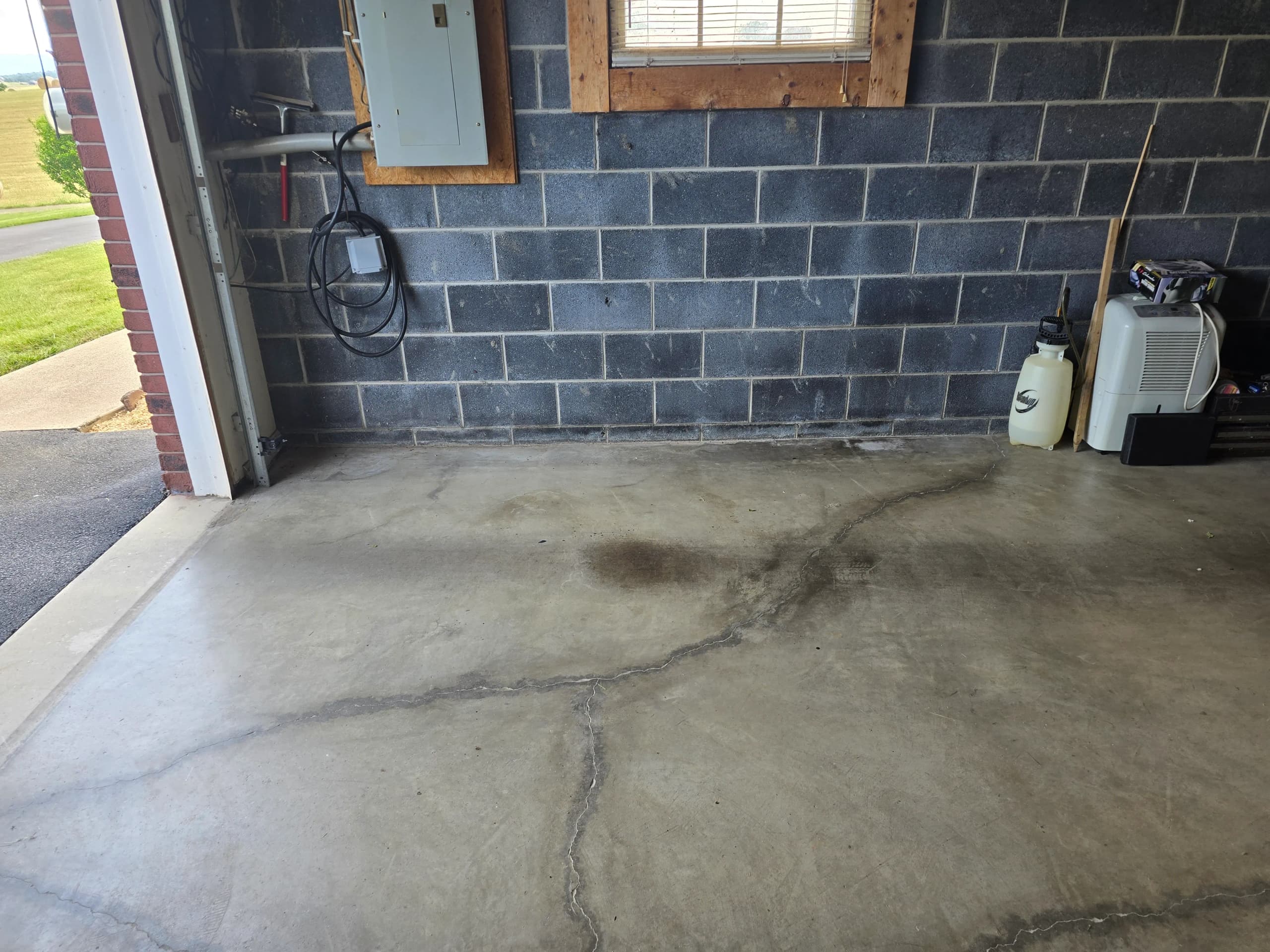 Cleared garage after cleanout by Kraken Junk Removal