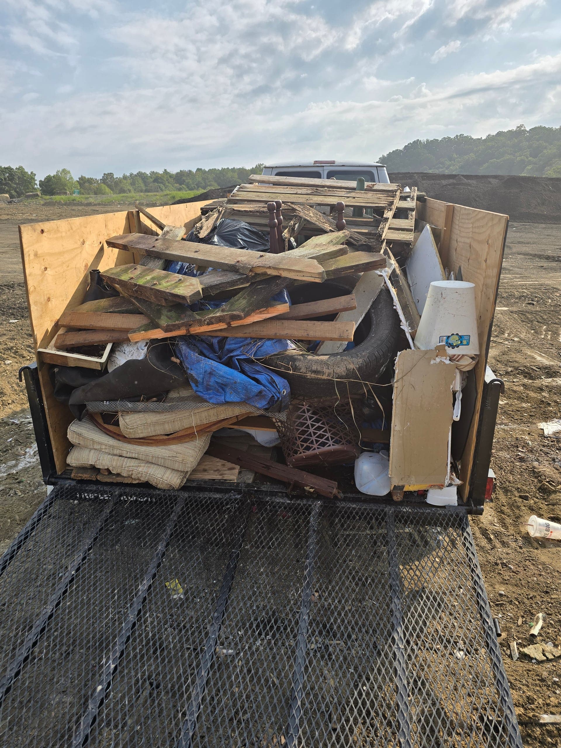 Remodel materials staged for construction debris hauling in Johnson City, TN