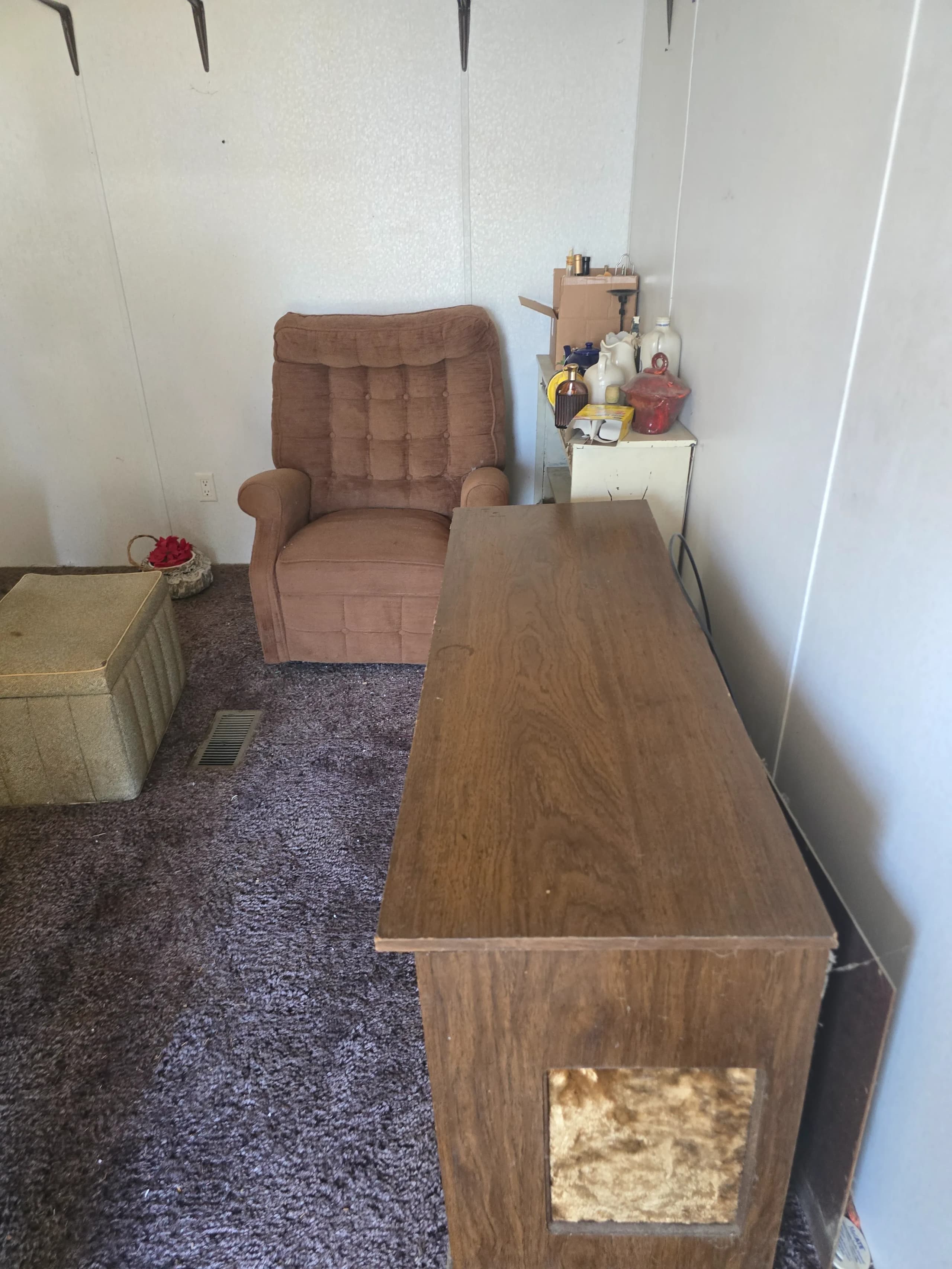 Furniture staged for furniture removal by Kraken Junk Removal