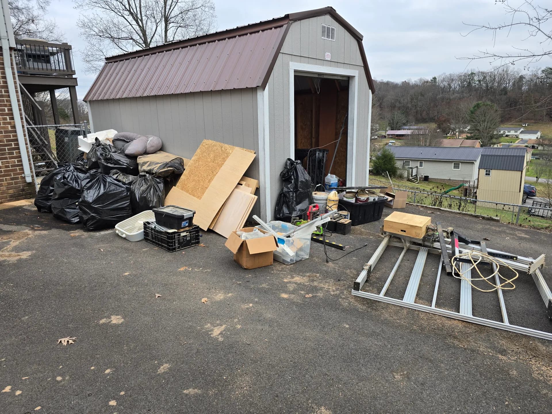 Outdoor shed and property cleanout at a Kingsport home