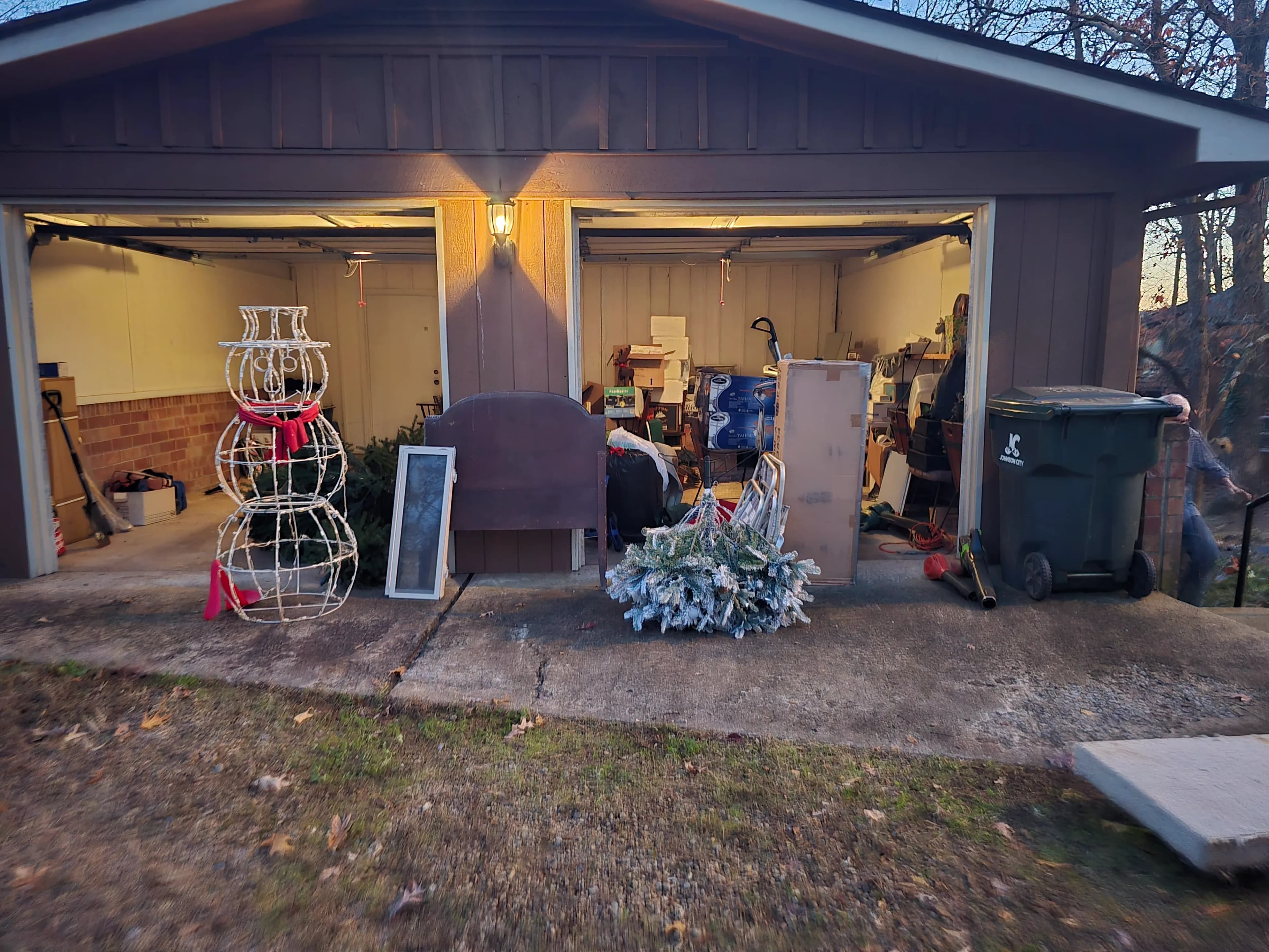 Two-car garage before cleanout in Piney Flats, TN