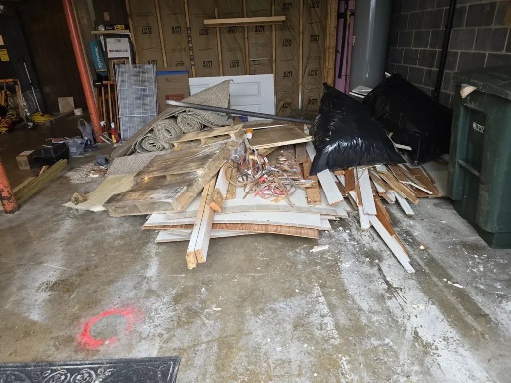 Professional construction waste cleanup service in Tri-Cities, TN by Kraken Junk Removal, specializing in the safe removal of debris like concrete, wood, and drywall from job sites.